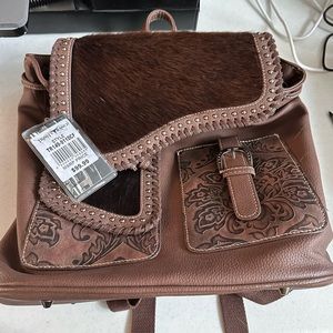 Trinity Ranch Hair-On Cowhide Saddle Shape Collection Backpack